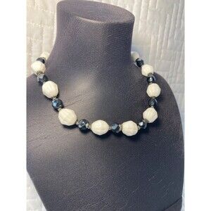 Black and white glass beads made into a beautiful choker. 15 in